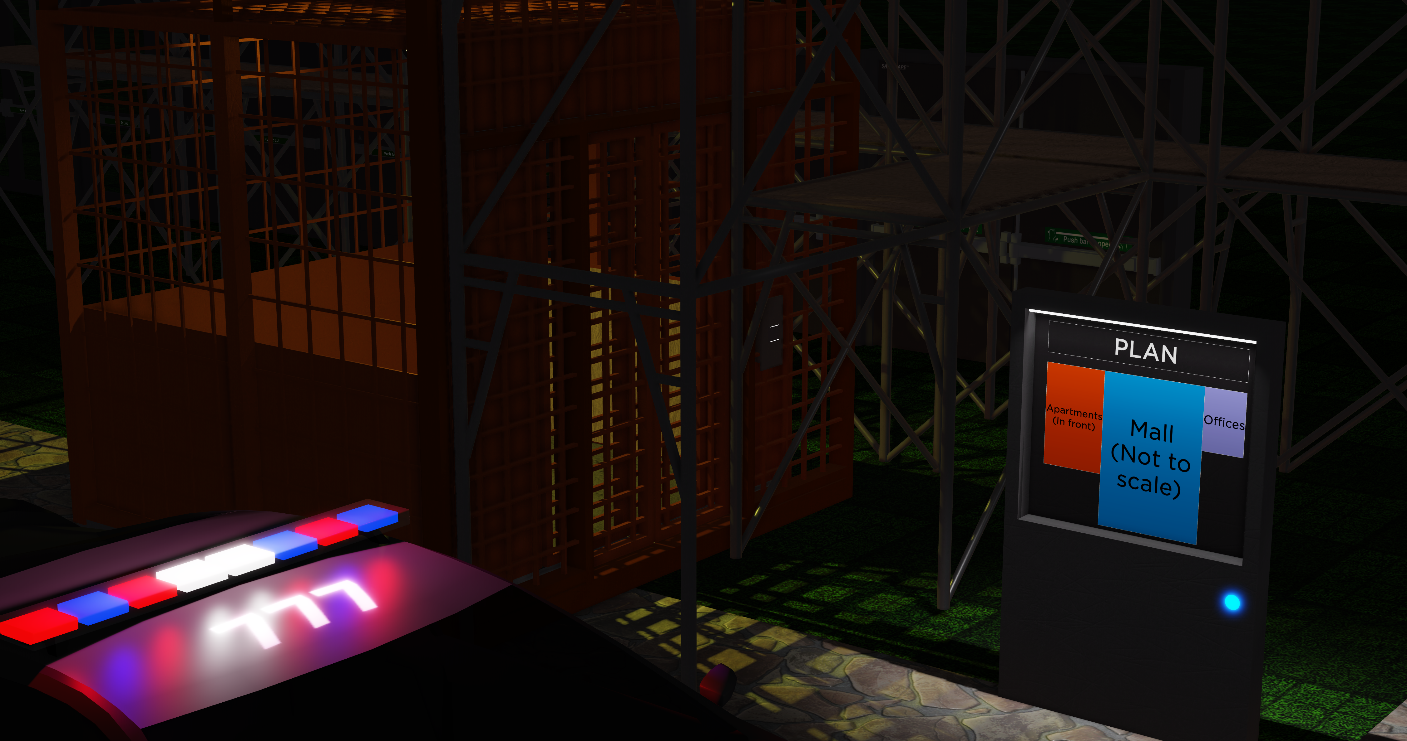 A construction site with scaffolding and a construction elevator